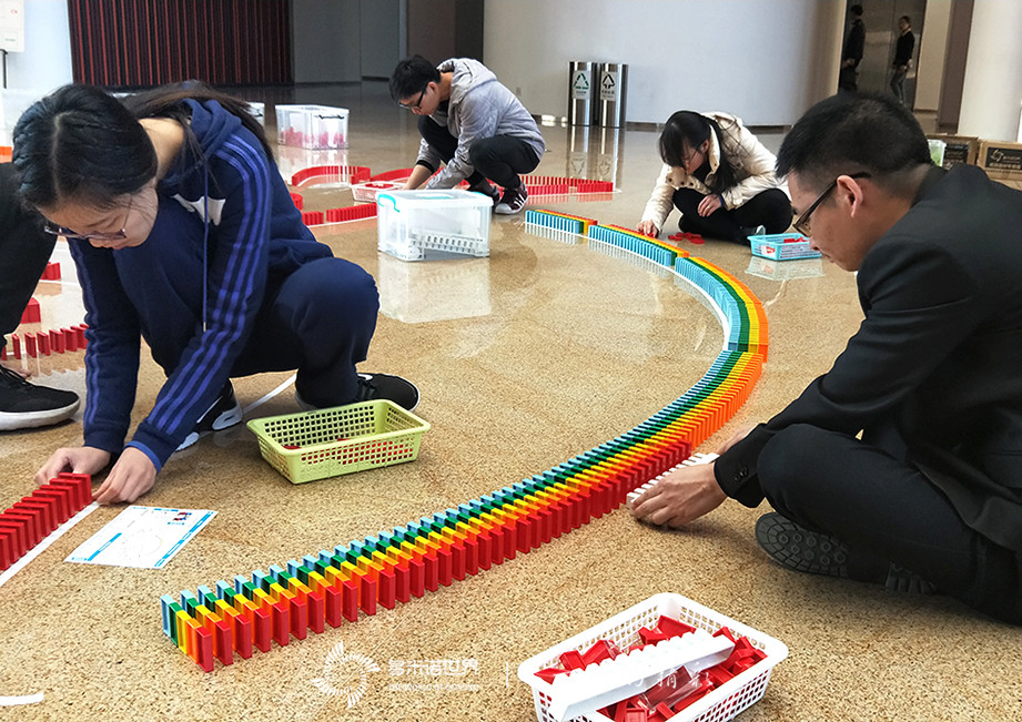 “世界级”用友，2019新员培训“再出发”挑战多米诺